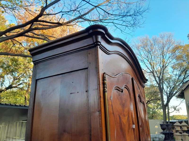 An Early 19th Century French Walnut and Cherrywood Port Armoire with Original Brass Fittings