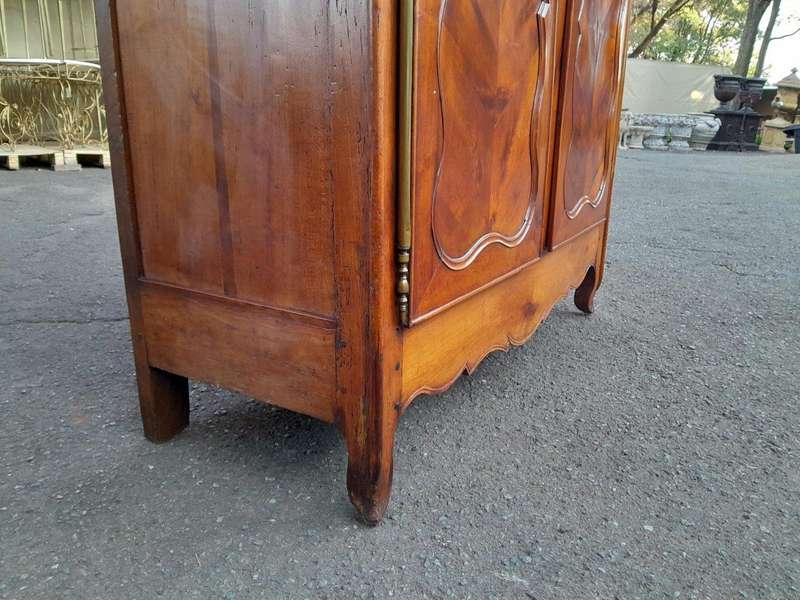 An Early 19th Century French Walnut and Cherrywood Port Armoire with Original Brass Fittings