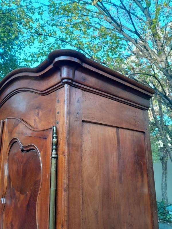 An Early 19th Century French Walnut and Cherrywood Port Armoire with Original Brass Fittings
