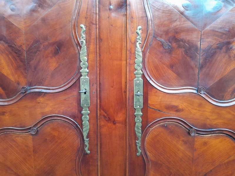 An Early 19th Century French Walnut and Cherrywood Port Armoire with Original Brass Fittings