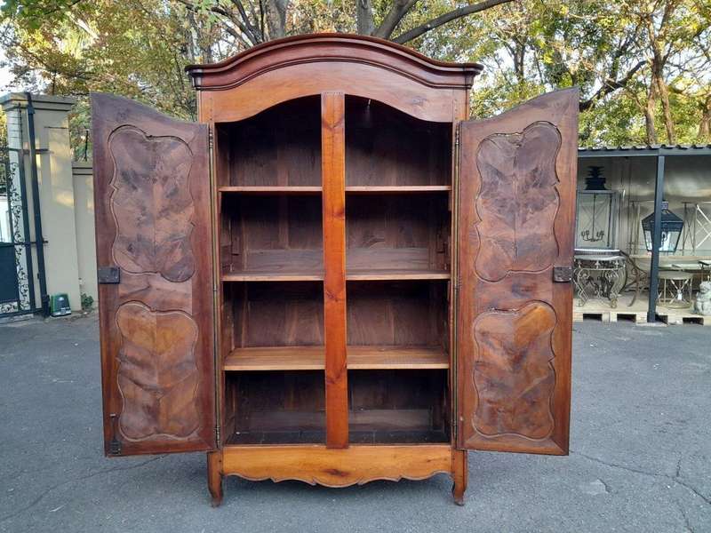 An Early 19th Century French Walnut and Cherrywood Port Armoire with Original Brass Fittings
