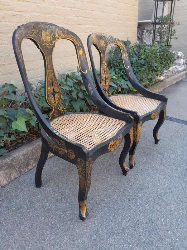 A Late 19th Century Pair of Chinoiserie Ebonised Mahogany Chairs with Rattan Seats