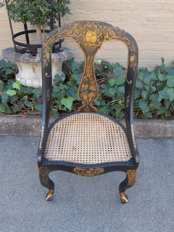 A Late 19th Century Pair of Chinoiserie Ebonised Mahogany Chairs with Rattan Seats
