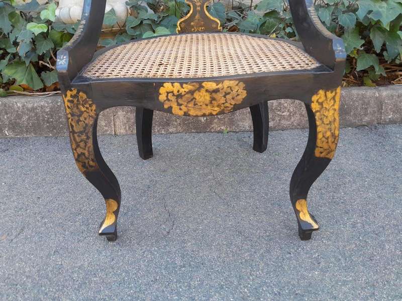 A Late 19th Century Pair of Chinoiserie Ebonised Mahogany Chairs with Rattan Seats