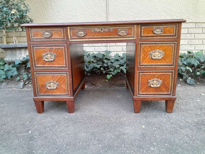 An Early 20th Century French Walnut And Gilt Mounted Desk