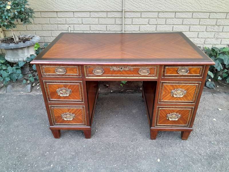 An Early 20th Century French Walnut And Gilt Mounted Desk