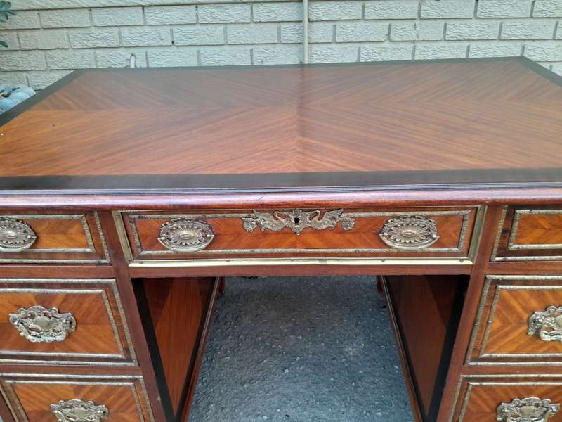 An Early 20th Century French Walnut And Gilt Mounted Desk