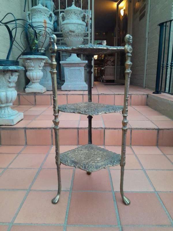 A 20th Century Chinoiserie Brass Stand On Paw Feet