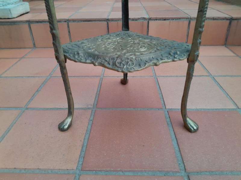 A 20th Century Chinoiserie Brass Stand On Paw Feet
