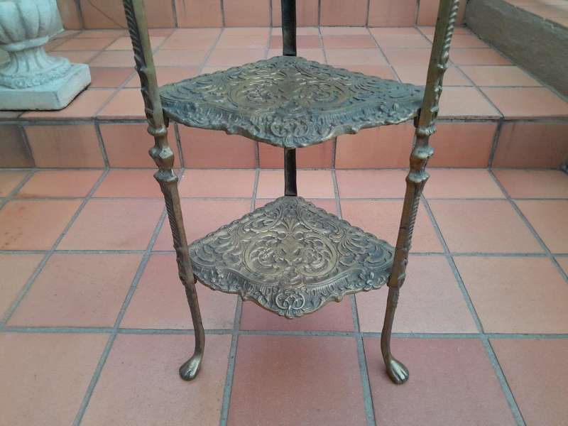 A 20th Century Chinoiserie Brass Stand On Paw Feet