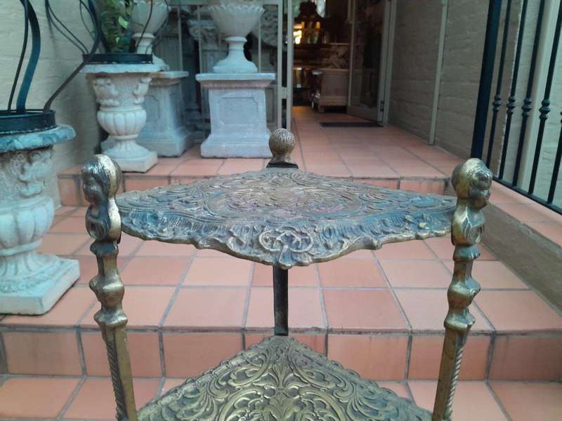 A 20th Century Chinoiserie Brass Stand On Paw Feet