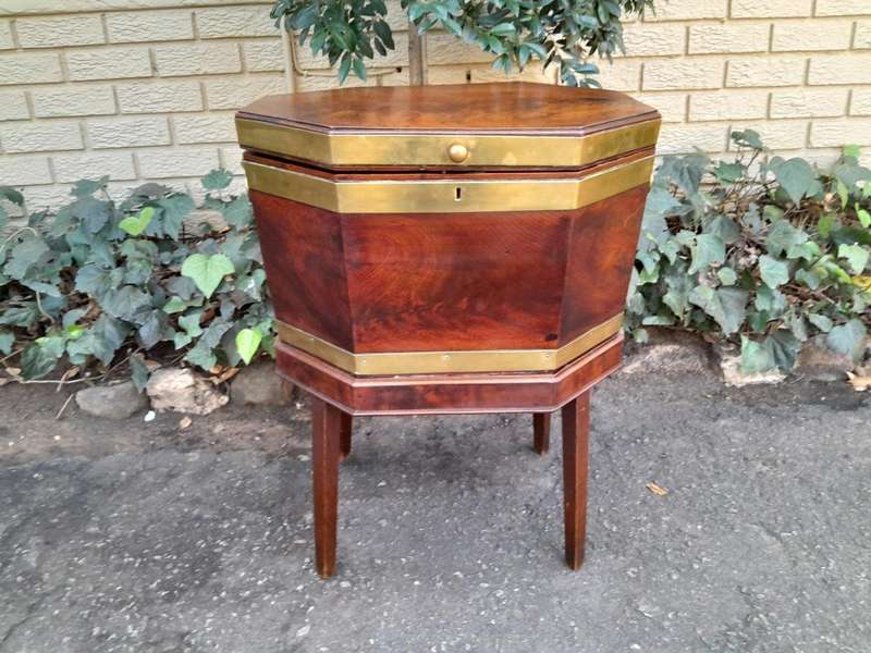 An Early 19th Century George III Mahogany Brass Bound Celleratte On Stand