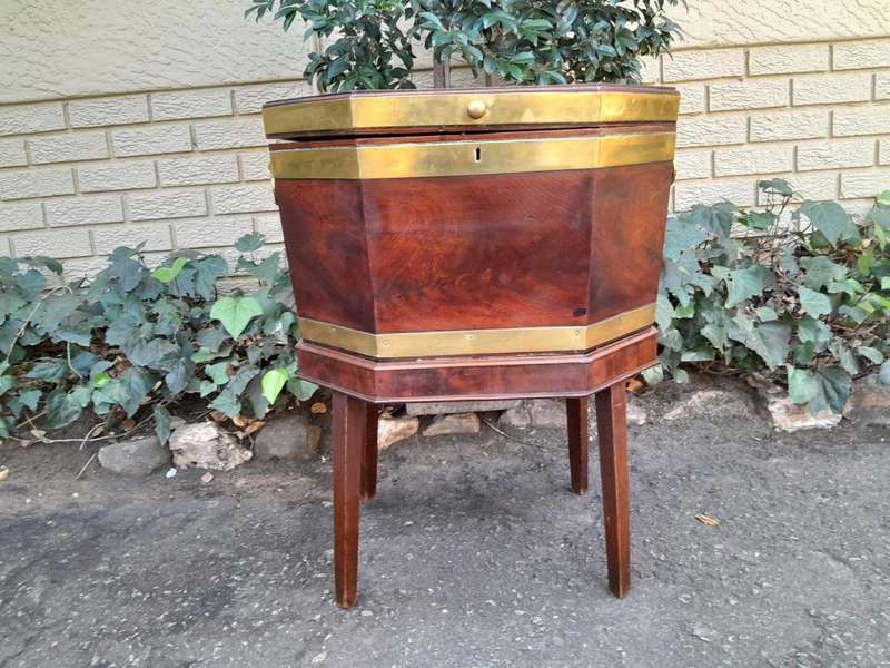 An Early 19th Century George III Mahogany Brass Bound Celleratte On Stand