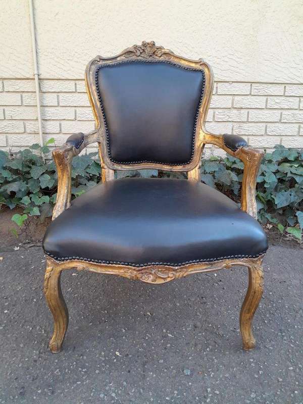 An Early 20th Century Pair of French Giltwood Bergere Armchairs Upholstered in Leather