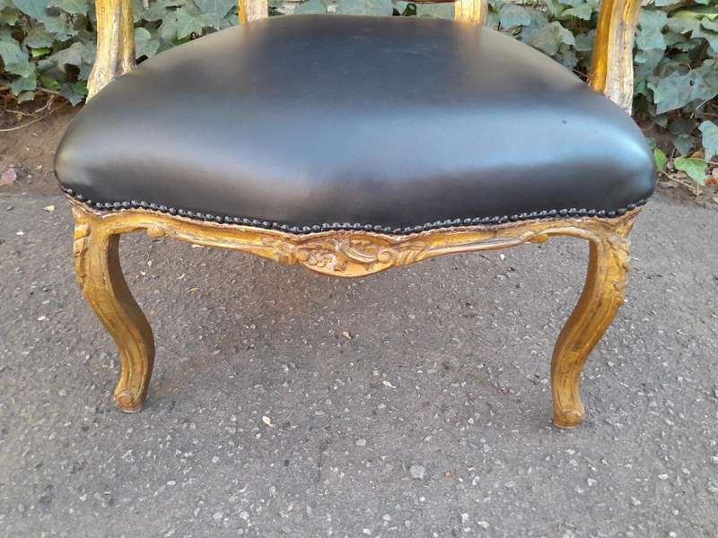 An Early 20th Century Pair of French Giltwood Bergere Armchairs Upholstered in Leather