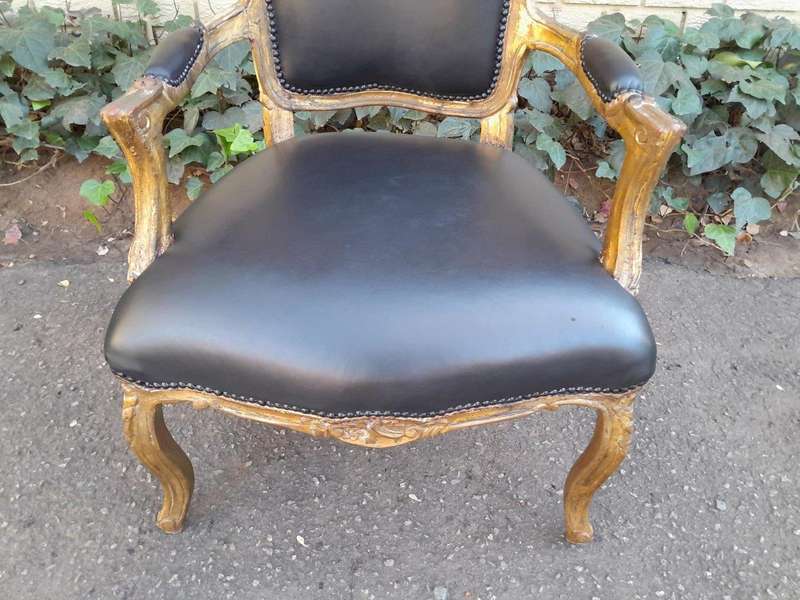 An Early 20th Century Pair of French Giltwood Bergere Armchairs Upholstered in Leather