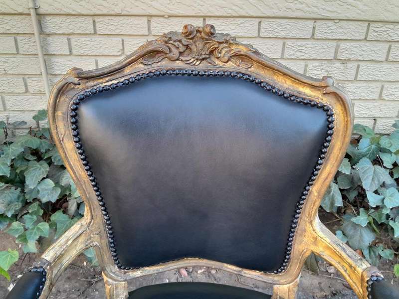 An Early 20th Century Pair of French Giltwood Bergere Armchairs Upholstered in Leather