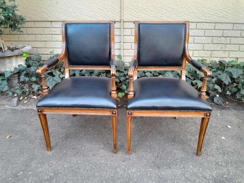 Pair Of A 20th Century French  Style Walnut Armchairs Upholstered In Leather