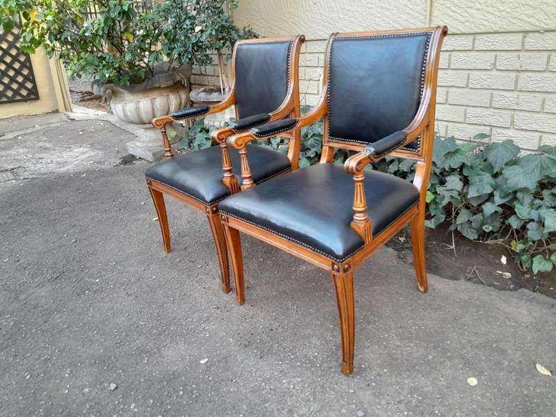 Pair Of A 20th Century French  Style Walnut Armchairs Upholstered In Leather