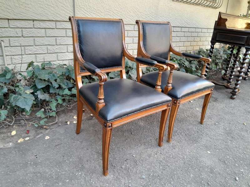 Pair Of A 20th Century French  Style Walnut Armchairs Upholstered In Leather