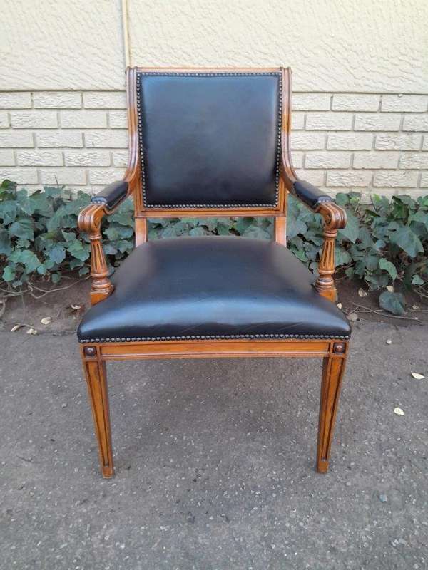 Pair Of A 20th Century French  Style Walnut Armchairs Upholstered In Leather