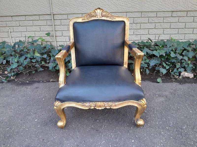 A 20th Century Near Pair  Of Victorian Style Hand-Gilded Mahogany Armchairs And Ottomans Upholst...