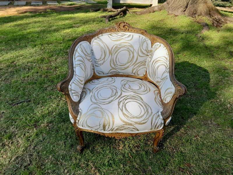 A Late 19th Century French Carved and Gilt Wood Walnut Bergere Armchair  Upholstered in  a cust...