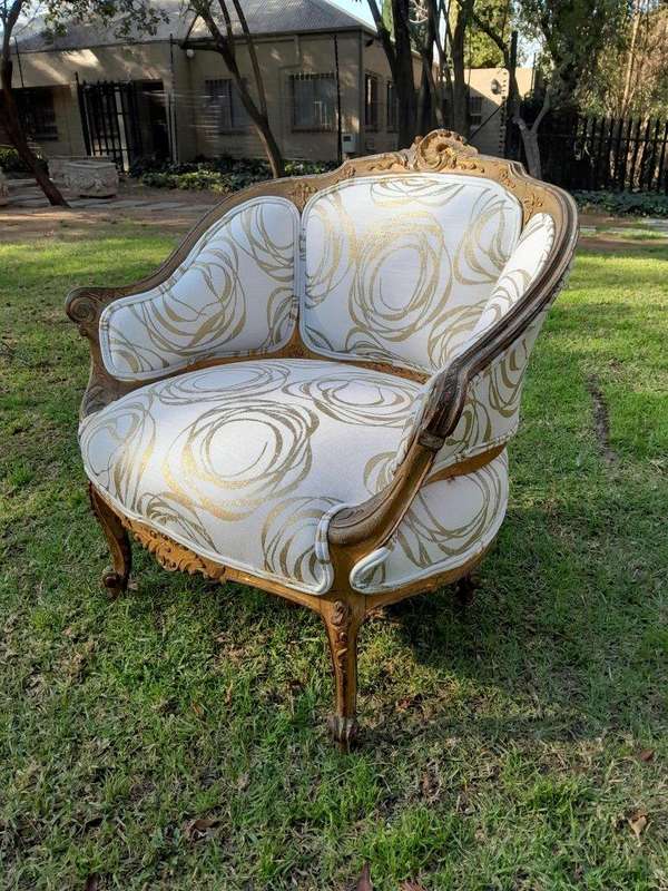 A Late 19th Century French Carved and Gilt Wood Walnut Bergere Armchair  Upholstered in  a cust...