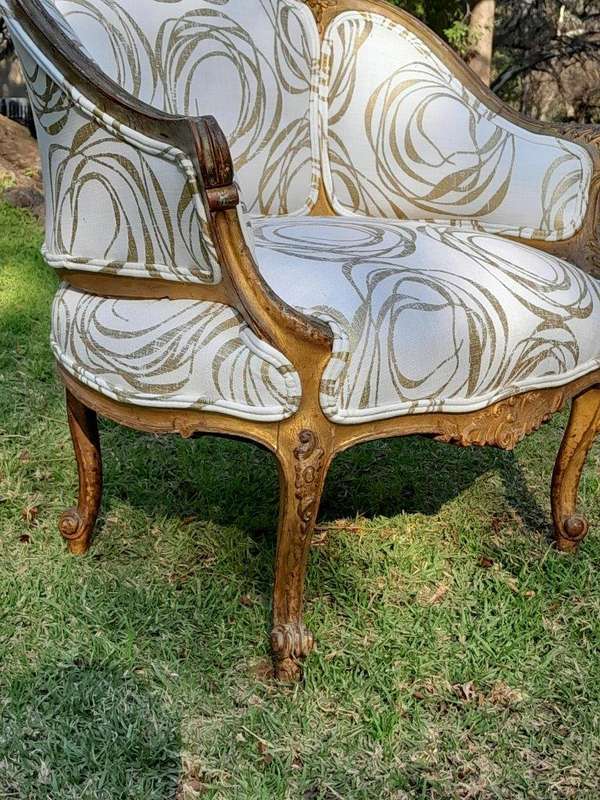 A Late 19th Century French Carved and Gilt Wood Walnut Bergere Armchair  Upholstered in  a cust...