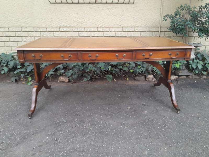 A 20th Century Victorian Style Mahogany Library Desk With  Original Gilt Tooled Leather Inserts O...