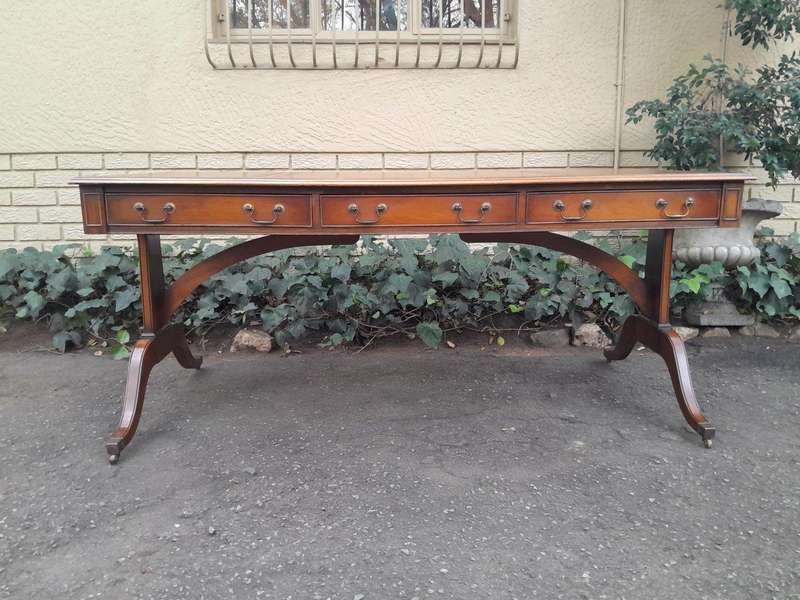 A 20th Century Victorian Style Mahogany Library Desk With  Original Gilt Tooled Leather Inserts O...