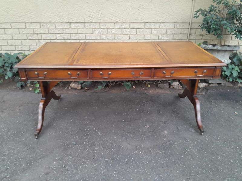 A 20th Century Victorian Style Mahogany Library Desk With  Original Gilt Tooled Leather Inserts O...