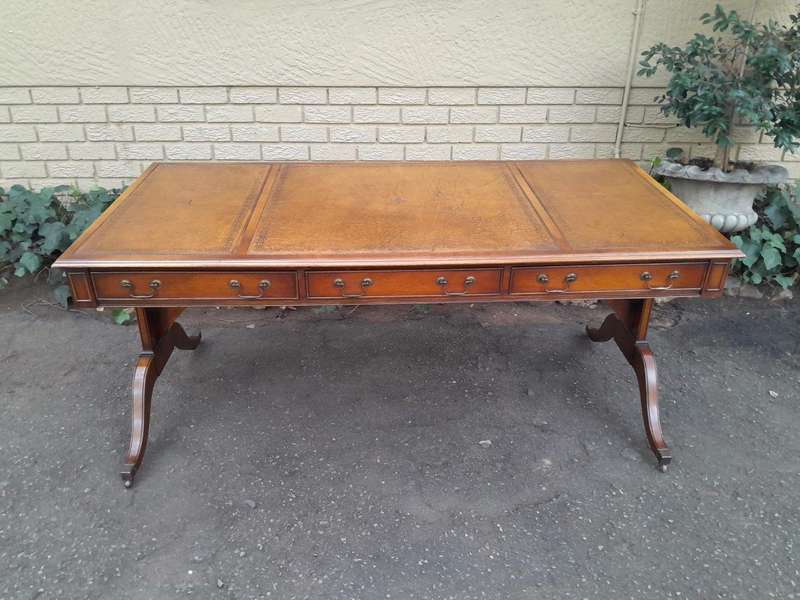 A 20th Century Victorian Style Mahogany Library Desk With  Original Gilt Tooled Leather Inserts O...