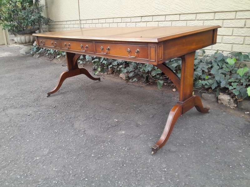 A 20th Century Victorian Style Mahogany Library Desk With  Original Gilt Tooled Leather Inserts O...