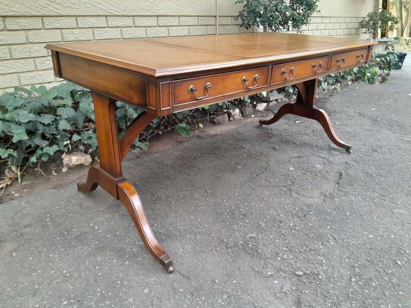 A 20th Century Victorian Style Mahogany Library Desk With  Original Gilt Tooled Leather Inserts O...