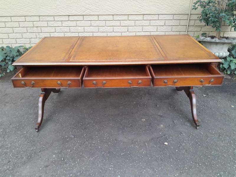 A 20th Century Victorian Style Mahogany Library Desk With  Original Gilt Tooled Leather Inserts O...