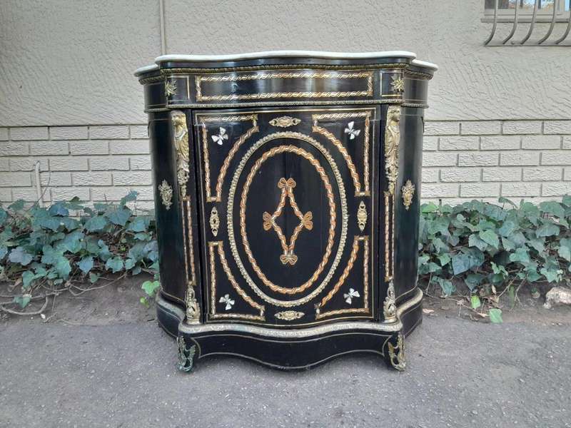 A 19th Century French Credenza With Marquetry Inlay. Mother Of Pearl And Ormolu And White Marble Top