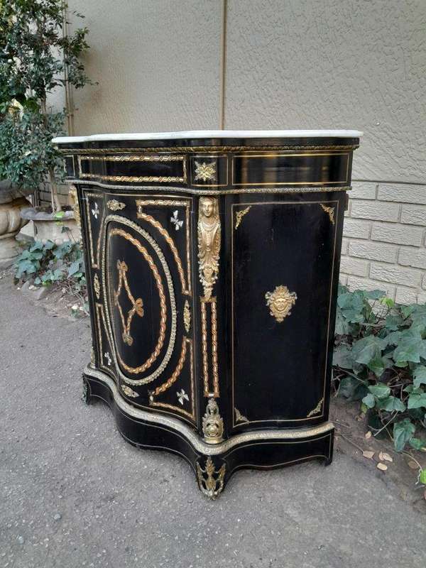 A 19th Century French Credenza With Marquetry Inlay. Mother Of Pearl And Ormolu And White Marble Top