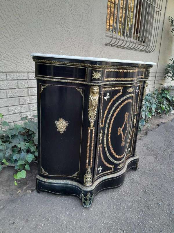 A 19th Century French Credenza With Marquetry Inlay. Mother Of Pearl And Ormolu And White Marble Top