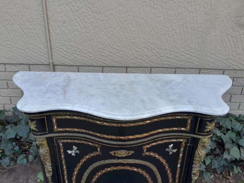 A 19th Century French Credenza With Marquetry Inlay. Mother Of Pearl And Ormolu And White Marble Top
