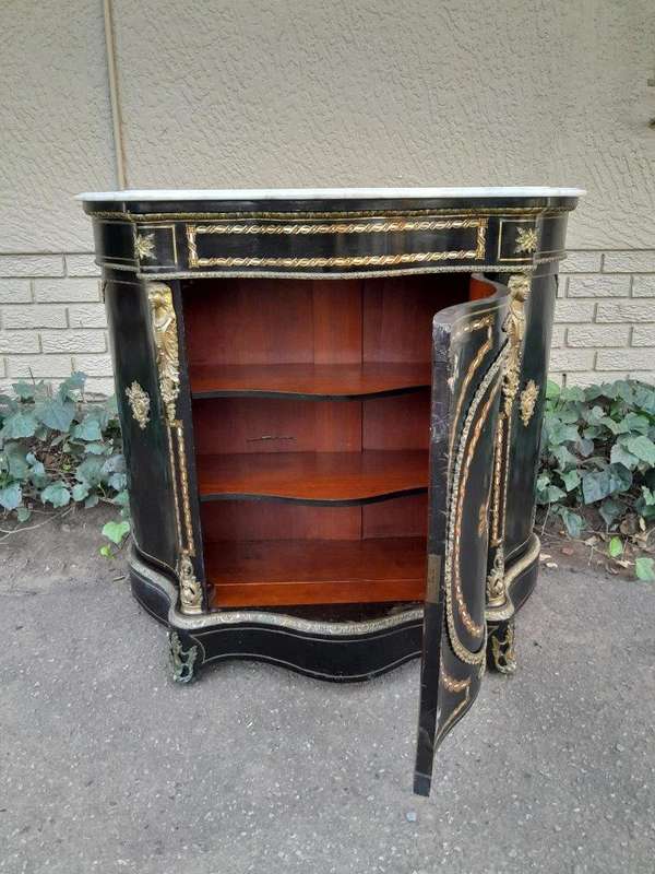 A 19th Century French Credenza With Marquetry Inlay. Mother Of Pearl And Ormolu And White Marble Top