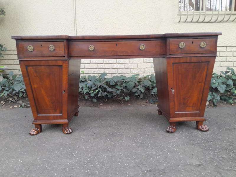 An 18th / 19th Century William IV Mahogany Sideboard With Ebony Inlay And Original Lion Claw Feet...