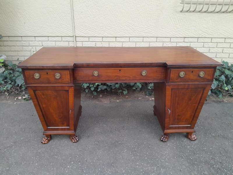 An 18th / 19th Century William IV Mahogany Sideboard With Ebony Inlay And Original Lion Claw Feet...