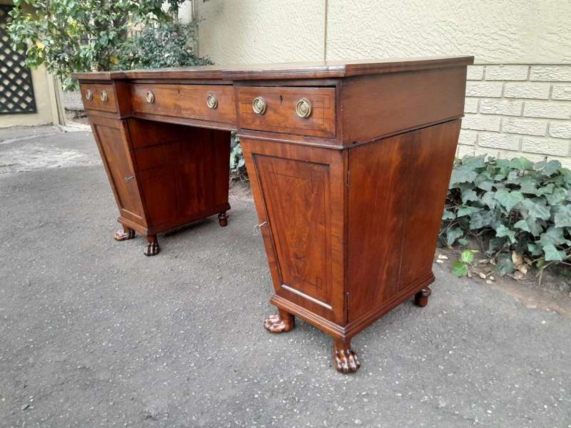 An 18th / 19th Century William IV Mahogany Sideboard With Ebony Inlay And Original Lion Claw Feet...