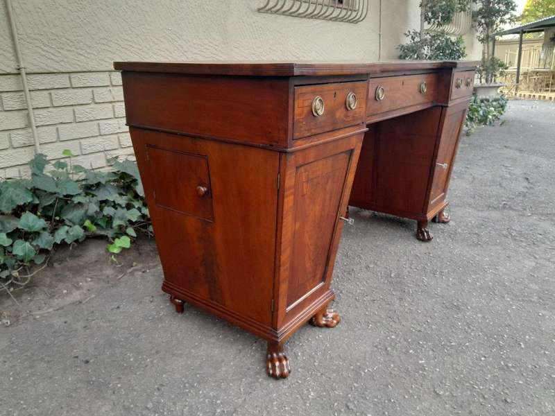 An 18th / 19th Century William IV Mahogany Sideboard With Ebony Inlay And Original Lion Claw Feet...