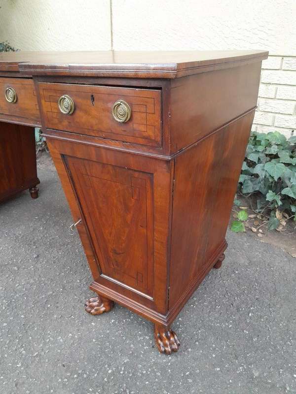 An 18th / 19th Century William IV Mahogany Sideboard With Ebony Inlay And Original Lion Claw Feet...