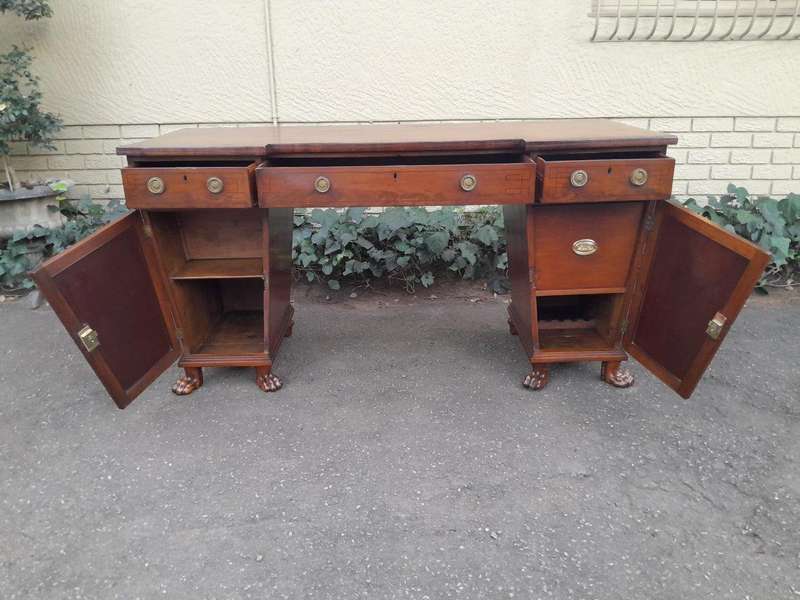 An 18th / 19th Century William IV Mahogany Sideboard With Ebony Inlay And Original Lion Claw Feet...
