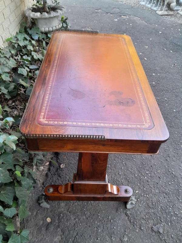 A 19th Century William IV Rosewood Desk with Gilt Tooled Leather and Gilt Metal Gallery Top on Br...
