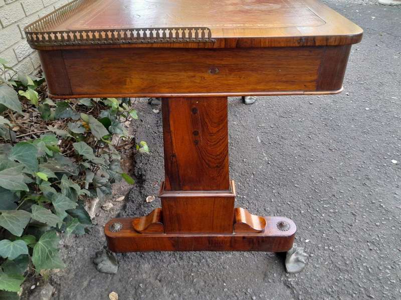 A 19th Century William IV Rosewood Desk with Gilt Tooled Leather and Gilt Metal Gallery Top on Br...