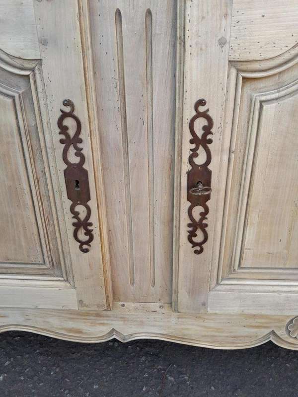 A 20TH Century French Walnut Sideboard with Original Iron hinges in a Contemporary Bleached Finish